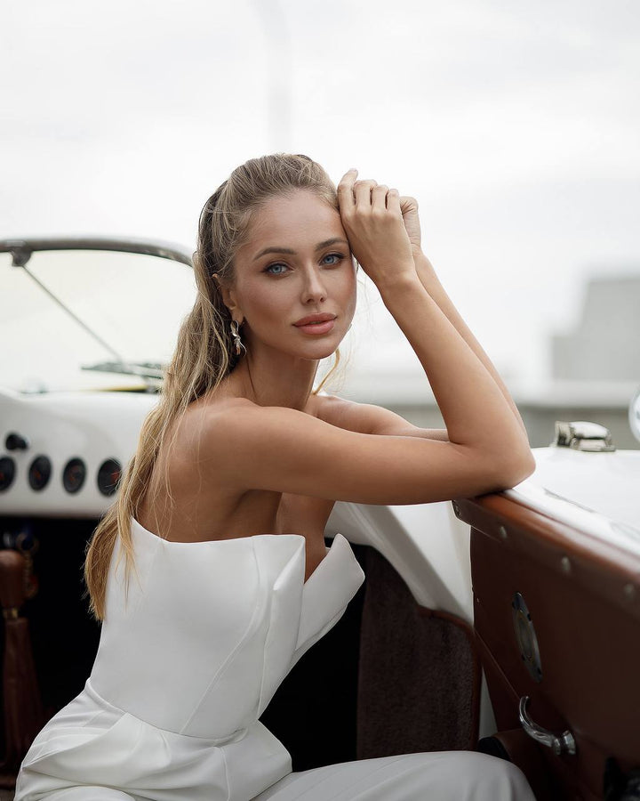 Baltas kombinezonas "Flatera"