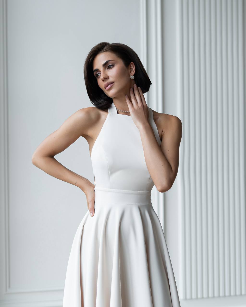 Kreminės spalvos midi suknelė "Bow tie back"