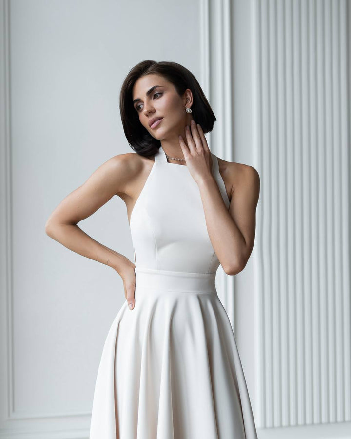 Kreminės spalvos midi suknelė "Bow tie back"