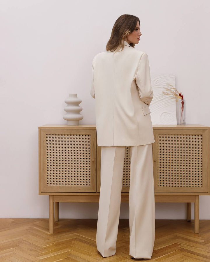 Kreminės spalvos kostiumas „Cotela“