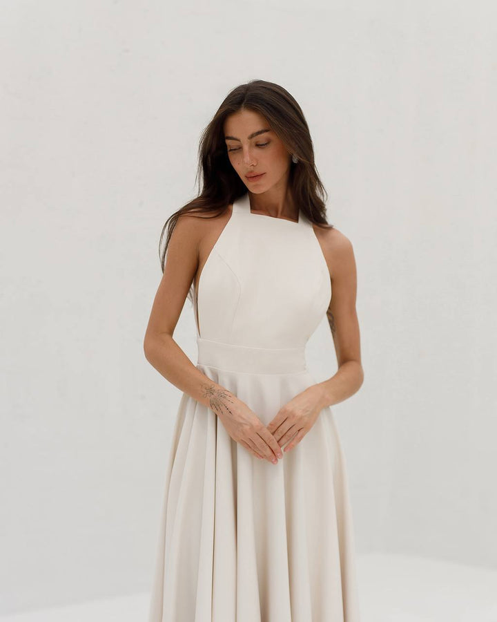 Kreminės spalvos midi suknelė "Bow tie back"