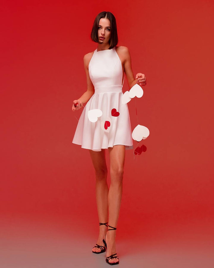 Balta mini suknelė "Bow tie back"