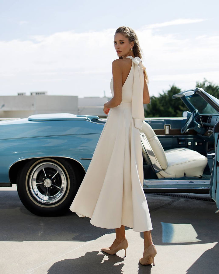 Cream color midi dress "Bow tie back"