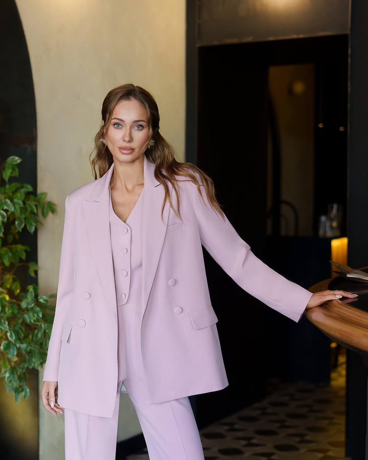 Pink three piece suit "Ultra classy"